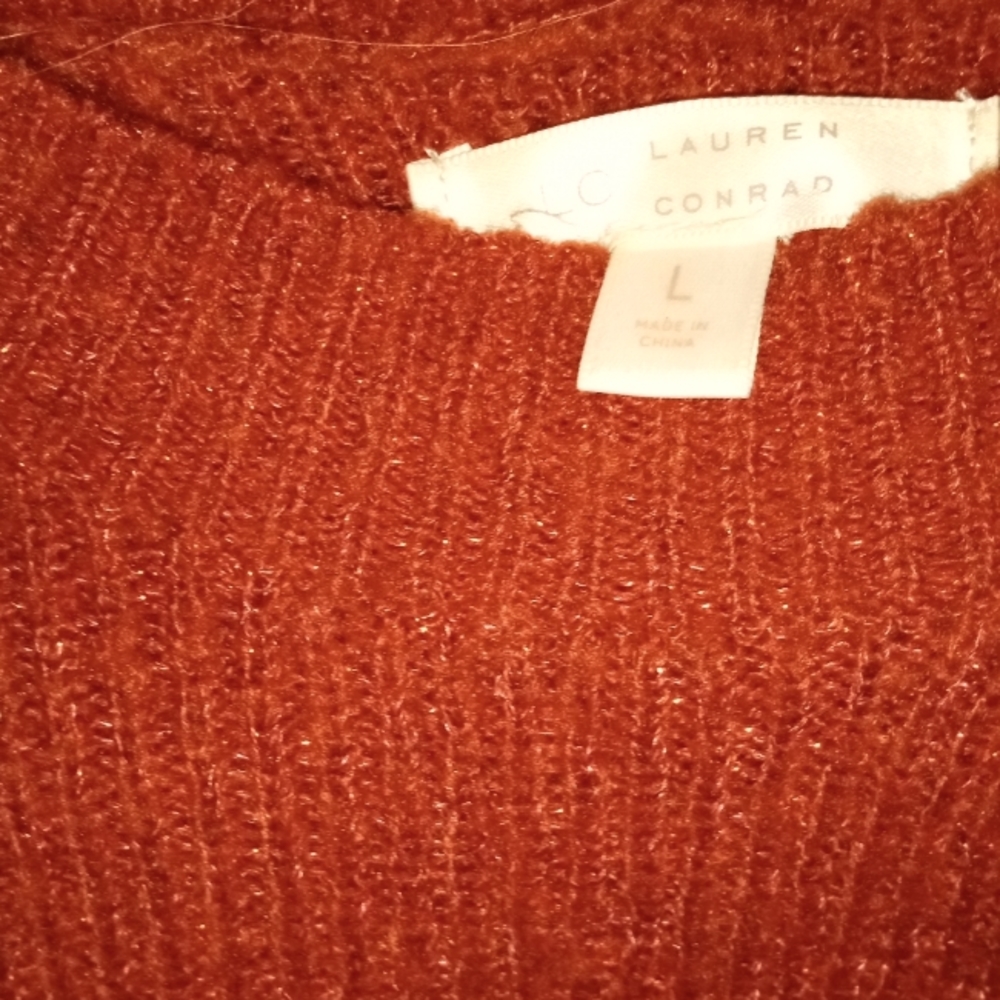 Lauren Conrad rust color size Large with tiny cutouts